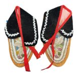 A pair of Native American bead and hide Moccasins, early 20th Century, Floral beadwork patterning