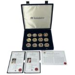 Range of gold-plated pictorial Diamond Jubilee coins, in presentation case with Westminster