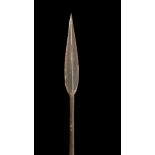 Long iron headed spear, long leaf spear head with seam line down centre affixed to a bamboo shaft