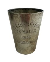 A continental silver cup, approx 92mm in height. Inscribed 'Preis-Reiten 18 Maerz 1898 Nana Ihrer