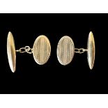 A pair of 9ct gold cufflinks with engine turned pattern. Chester hallmarks. Please see the buyer's