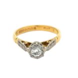 A hallmarked 18ct yellow gold and platinum diamond illusion ring, weight 2.69g. Size J. Diamond