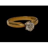 An approx 0.33 diamond set in 18ct gold ring. Size M. Total weight 3.22g. Birmingham hallmarks.