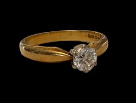 An approx 0.33 diamond set in 18ct gold ring. Size M. Total weight 3.22g. Birmingham hallmarks.