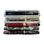 Four Conway Stewart Fountain Pens with 14 carat gold nibs two boxed. One German pen. 5 in total