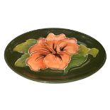 Moorcroft – A Moorcroft Hibiscus pattern pin tray, with Moorcroft Made in England imprinted to base.