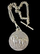 A silver Shire Horse Society medal with 1938 Birmingham hallmarks for Mappin & Webb. On one side two