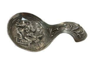 Dutch Silver caddy spoon with traditional figural design, interior scene to main part of spoon and