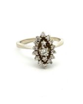 Diamond ring - round brilliant diamonds set in a marquise design in white gold, tests as 18ct.