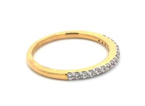 Half-eternity CZ ring, size O. Weight 2.93g. Stamped 916 (22ct). Good condition. Light surface