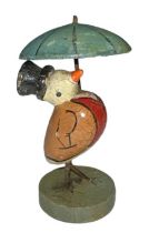 Anri, miniature Italian hand painted wooden Robbin figurine, with detachable parasol. With ‘Anri’