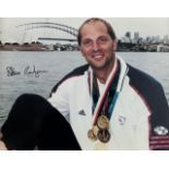 Sir Steve Redgrave signed framed photo. This framed picture contains two photos of Sir Steve