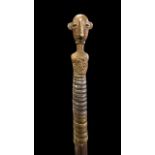 African spear, small shield shaped blade, twisted metal grip, wooden shaft with metal figural head