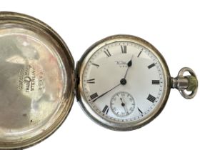 An American Waltham full hunter pocket watch with white enamel dial, Roman numeral markings and