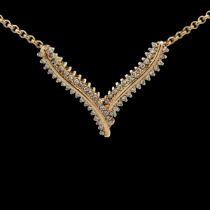 A diamond and 9ct gold wishbone necklace, Birmingham hallmarks. Weight 11.7g. Very good condition