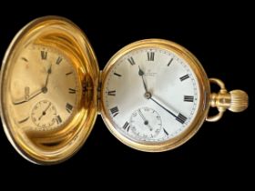 18ct gold pocket watch by Astral of Coventry. White enamel dial with Roman numeral hour markers