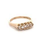 A paste five stone ring, size L, stamped 14K. Weight 2.88g. Paste stone with small chips and wear.