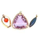 A 9ct gold purple paste triangular pendant, a 9ct marquise shaped purple jade pendant and a yellow