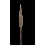 Long iron headed spear, long leaf spear head with seam line down centre affixed to a bamboo shaft,