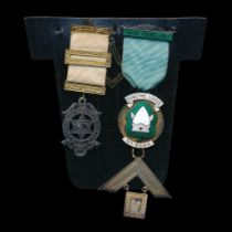 Masonic Jewel pair for Danetre Lodge, Daventry. With Green & White enamel Danetre Lodge No. 8594