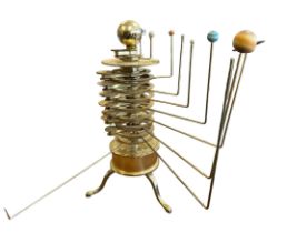 An Eaglemoss constructed solar system brass orrery, missing Neptune, otherwise in good condition.