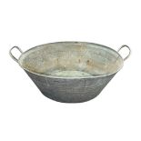 Oval galvanised tin bath with handles, approx. size Diameter: 63cm/25 inches, generally good plus to