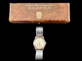 A Smiths De Luxe 15 jewel 9ct gold watch, No. C255167. Case approx 31mm diameter, Arabic numerals at