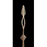 Long double-sided spear, with ornate twisted Spear head with small arrow head on top of a hollow