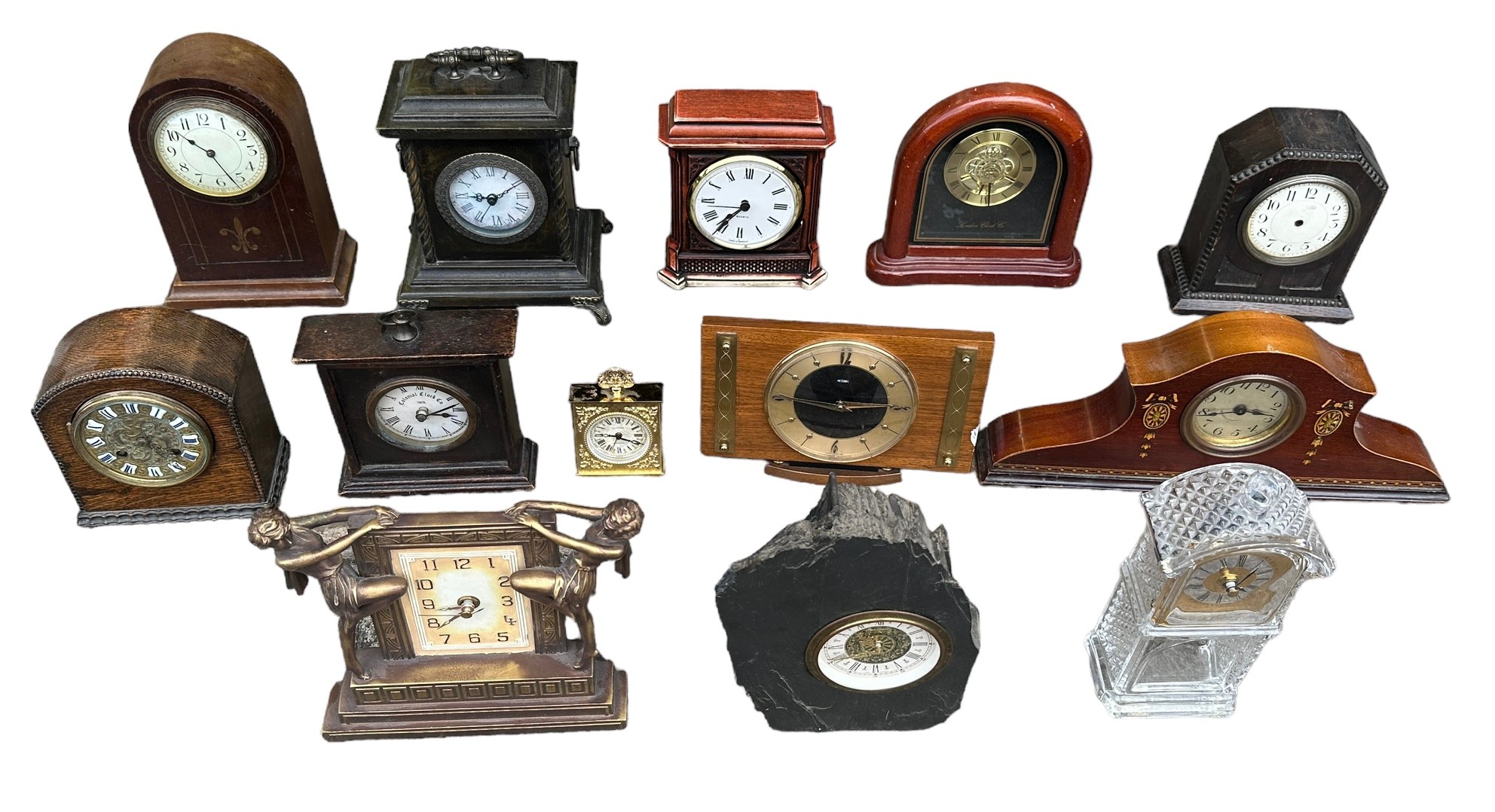 A collection of 16 various clocks plus parts, with one by the Colonial Clock Co., one by Europa, a