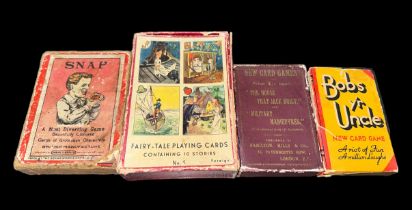 Small collection of vintage playing card games including Snap, Fairy-Tale, Unique and Bobs y'r