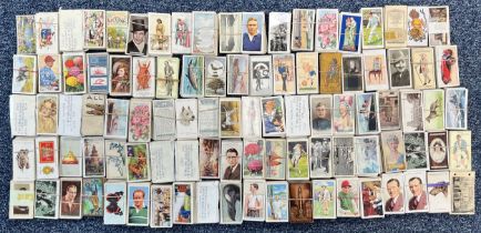 Collection of cigarette cards, apparently complete sets, in bundles, in variable condition with