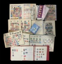 World untidy accumulation of stamps in twelve assorted volumes including Viceroy album with early