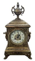 A French ormolu style brass mantel clock with enamelled dial, height 40cm. In working order.