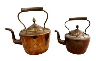 Pair of Copper Kettles, two sized. Largest height 32cm, width 23cm. Smallest height 23cm, width