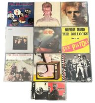 Large vinyl record collection including albums by The Sex Pistols, The Clash, David Bowie. Also