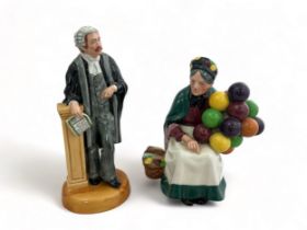 Two Royal Doulton figurines - The Old Balloon Seller and The Lawyer. Both in good condition, tiny