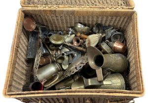 Various Antique Brassware in a wicker basket. Various items include mantle brushes, jugs,