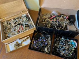 A large collection of costume jewellery, watches etc.