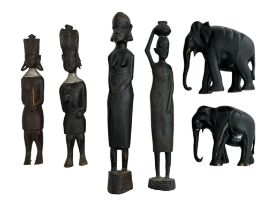 African, group of carved African objects to include; three hardwood figurines plus other and two