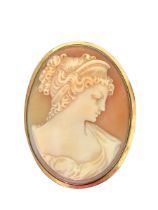 A shell cameo brooch set in unmarked 14ct gold. Length 48mm, weight 12.7g. Please see the buyer's