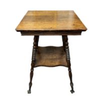 Late 19th Century oak two-tier table, probably American, terminating on claw and glass ball feet.