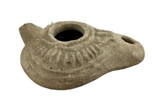 Roman, Terracotta pottery Oil lamp, 3rd – 4th Century A.D. Convex body with two openings and a