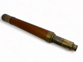 A single draw Day or Night brass telescope by Jones of London. Approx 86cm when extended.