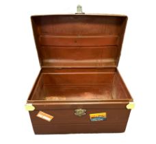 Large vintage metal trunk painted brown finish with reproduction stickers.