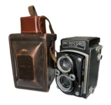 Microcord camera with shutter and leather case. Serial no 76003. Generally in good condition,