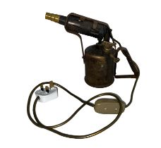 A Burmos brass blow torch converted to a lamp