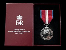 Queen Elizabeth II – The Queen’s Diamond Jubilee Medal 1952-2012, boxed.