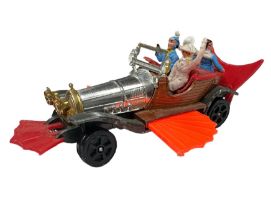Corgi Juniors uncarded Chitty Chitty Bang Bang No. 1006, bright orange pull-out wings, seated