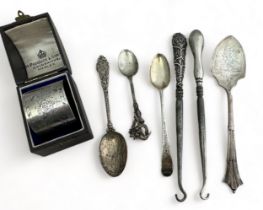 A range of silver and white metal . Includes a boxed Victorian silver napkin ring by Walter & John