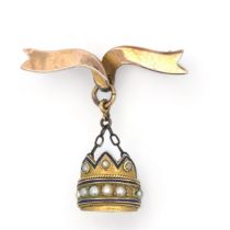 A hallmarked 9ct brooch in a ribbon form with a yellow metal, enamel and seed pearl crown pendant
